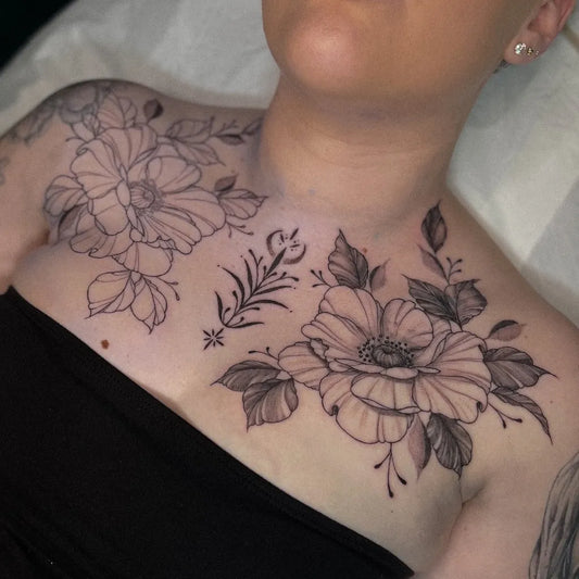 Big Floral Poppies and Leaves on Women Chest Tattoo by @jbrooker_tattoo