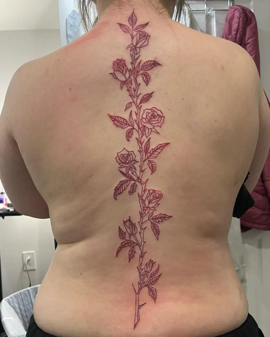 Big Floral Rose Vine on Women Spine Tattoo by @ladysmoke.inkk