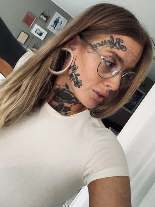 Big Floral Rose on Women Face Tattoo by @alexandra.allansson