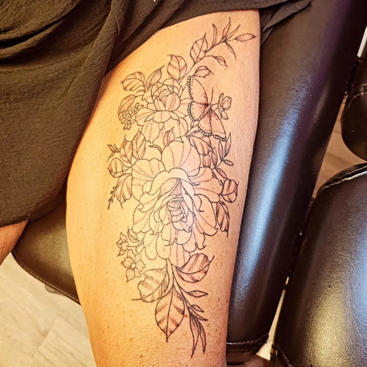 Big Floral Roses and Butterflies on Women Thigh Tattoo by @garyhornsey