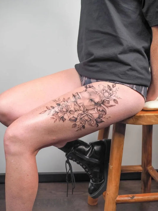 Big Floral Skull on Women Thigh Tattoo by @soulpurposetattoo