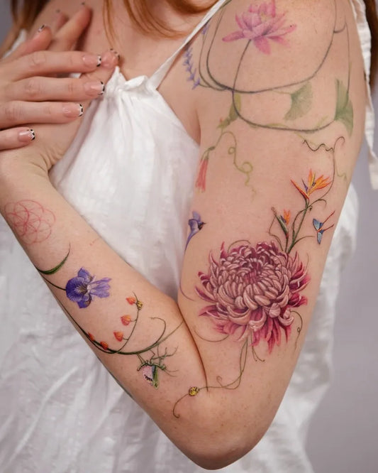 Big Floral Sleeve Wildflowers Chrysanthemum Delphinium on Women Arm Flower Tattoo by @ozlemalakoc_