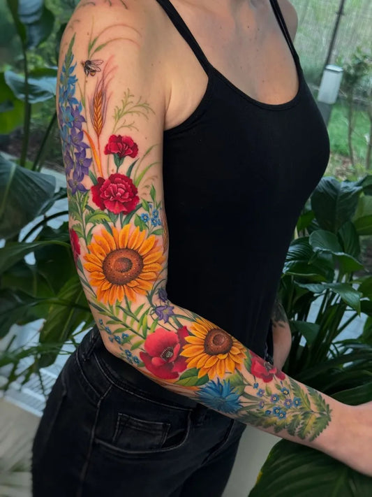 Big Floral Sleeve Wildflowers Sunflowers Poppies on Women Arm Flower Tattoo by @hornedqueen_ink