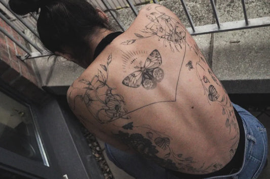 Big Floral and Butterfly on Women Back Tattoo by @mendjeli_tattoo