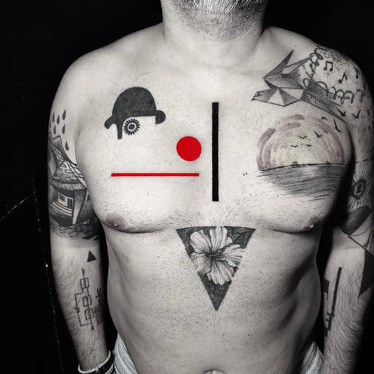 Big Geometric Charlie Chaplin and Flower on Men Chest Tattoo by @yannis.ink