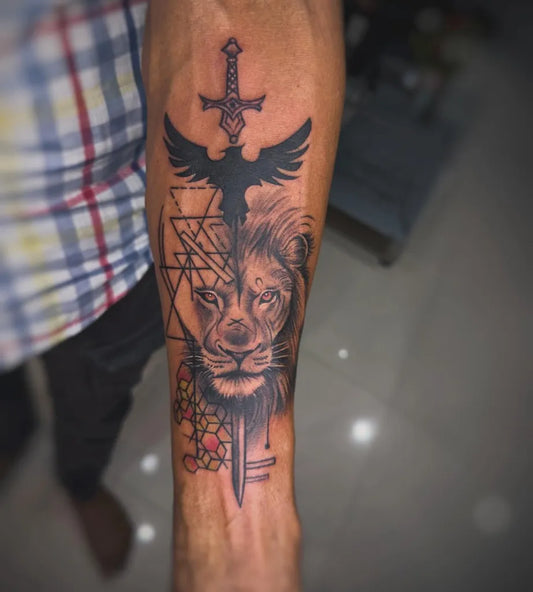 Big Geometric Lion Sword Wings on Men Arm Tattoo by @90s_tattoo_jodhpur