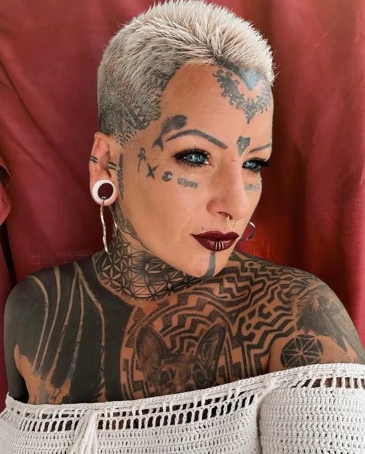 Big Geometric Skull on Women Face Tattoo by @neckandthroat_tattoos