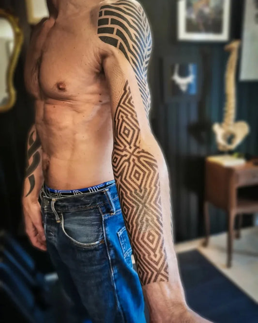 Big Geometric Tribal Patterns on Men Arm Tattoo by @ben_gicqueau_tattoo