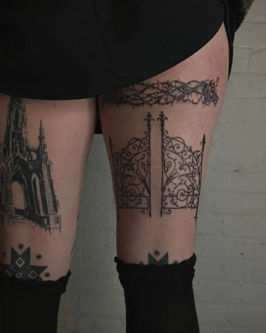 Big Gothic Gothic Gates and Cathedral on Women Thigh Tattoo by @lucky.you.tattoo