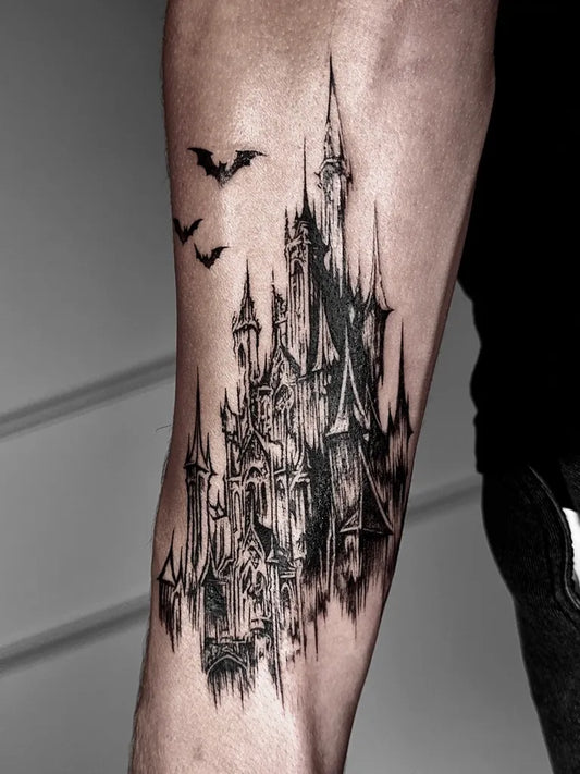Big Gothic Haunted Castle with Bats Tattoo on Men Arm by @ghostnapzzz