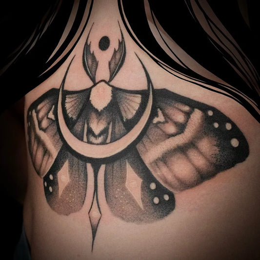 Big Gothic Moth on Women Sternum Tattoo by @roobusmoonwitch