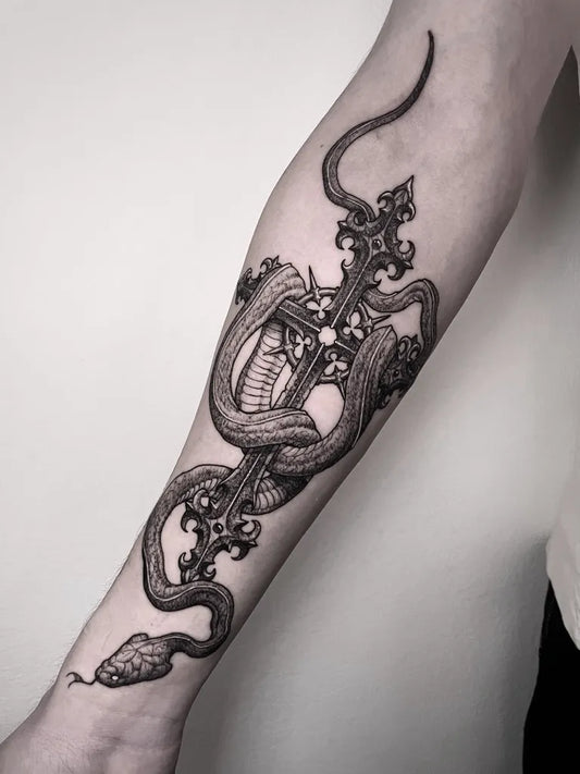 Big Gothic Snake Wrapped Cross Tattoo on Men Arm by @hecatomb_ttt