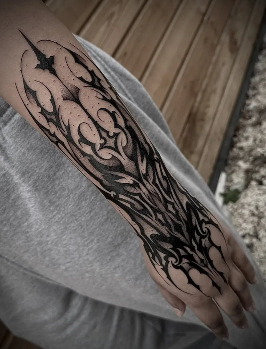 Big Gothic Spiky Ornate Vines Tattoo on Men Forearm by @toon.ink_industry