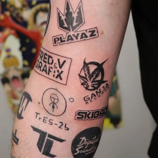 Big Graffiti Logos and Cannabis Leaves Music Tattoo on Men Arm by @theinkdomain