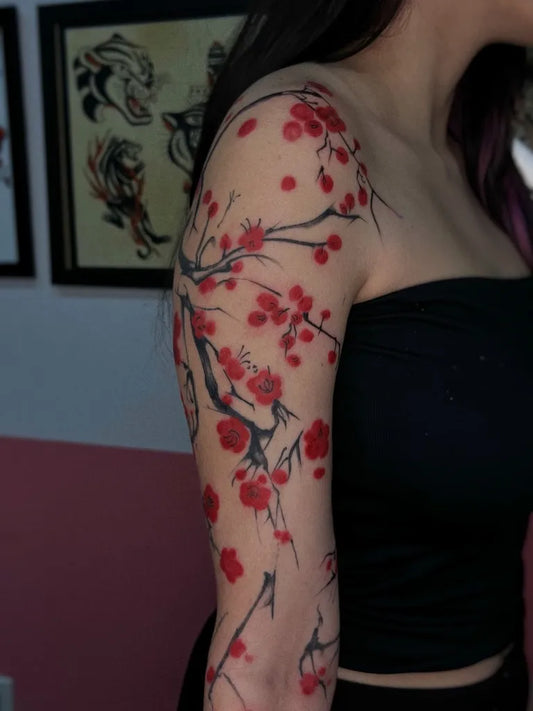 Big Illustrative Cherry Blossom Branches on Women Shoulder Tattoo by @laurandradetattoo