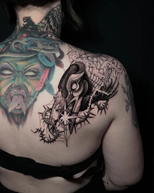 Big Illustrative Crow Medusa Tattoo on Women Back by @loons_tattoo