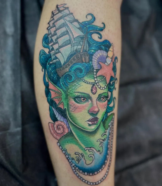 Big Illustrative Mermaid Ship Tattoo on Women Leg by @all_buttered_up