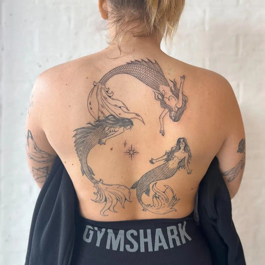 Big Illustrative Mermaids Tattoo on Women Back by @chelsdorntattoo