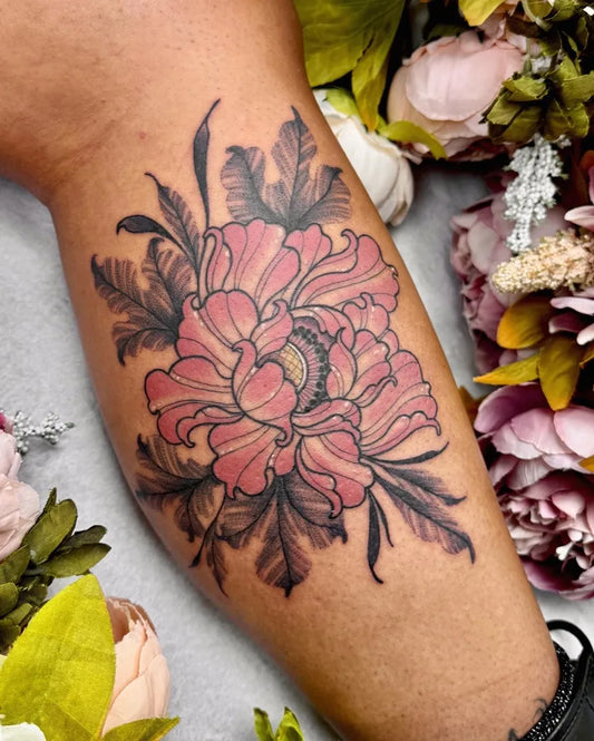 Big Illustrative Peony and Leaves on Women Thigh Tattoo by @miss.saskiatattoo