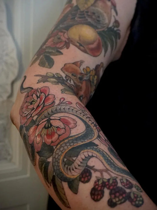 Big Illustrative Snake Fox Berries Nature Tattoo on Women Arm by @melisehilltattoo