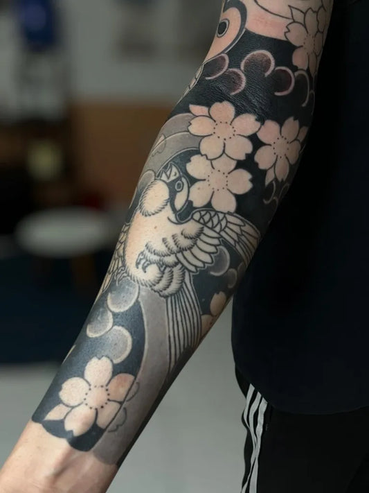 Big Irezumi Phoenix and Cherry Blossoms Tattoo on Men Arm by @yumi_irezumi