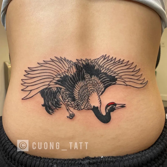 Big Irezumi Red Crowned Crane Tattoo on Women Lower Back by @amourtattooinc