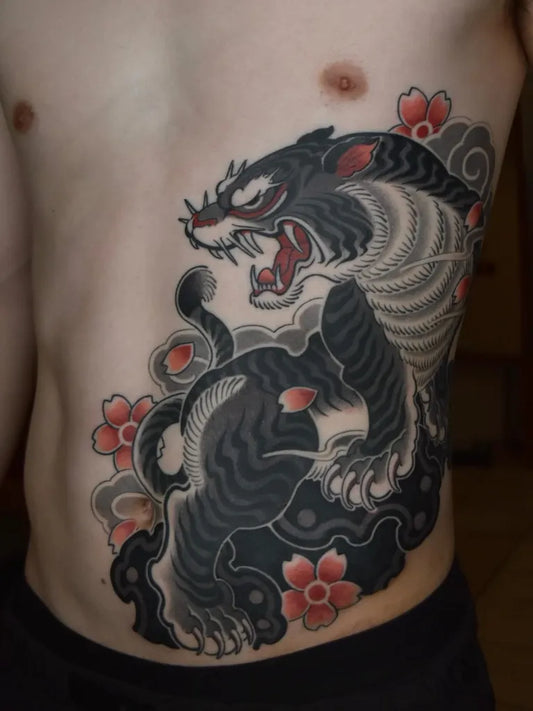 Big Japanese Black Tiger with Red Flowers and Clouds on Men Torso Tattoo by @ao_rainfall