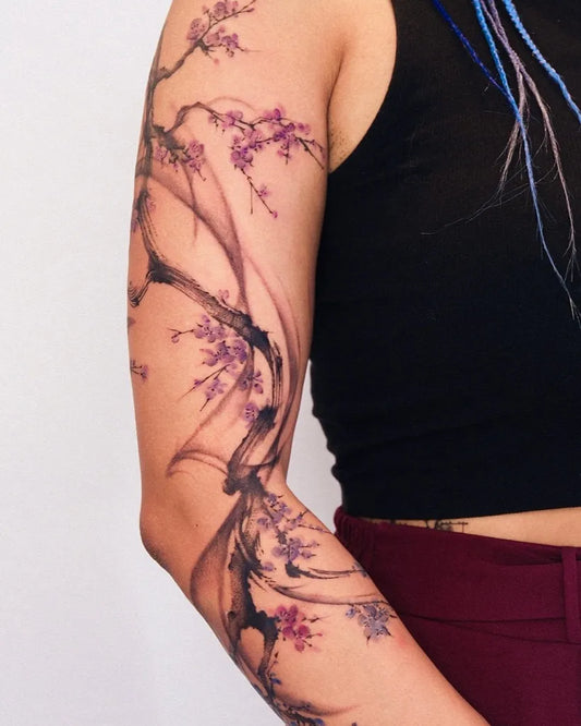 Big Japanese Cherry Blossom Branches on Women Arm Tattoo by @inkfluid.joy