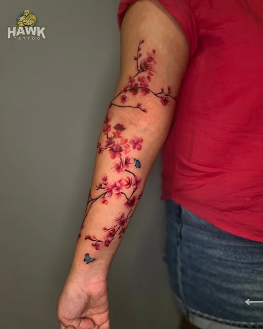 Big Japanese Cherry Blossom and Butterfly on Women Arm Tattoo by @adi_inc