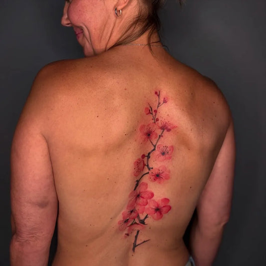 Big Japanese Cherry Blossom on Women Back Tattoo by @linink.tattoo