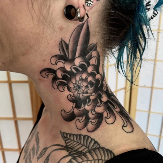 Big Japanese Chrysanthemum and Leaves on Women Neck Tattoo by @zenobiatattoos