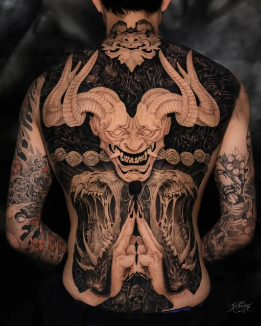 Big Japanese Demon Mask and Praying Hands on Men Back Tattoo by @tattooassist