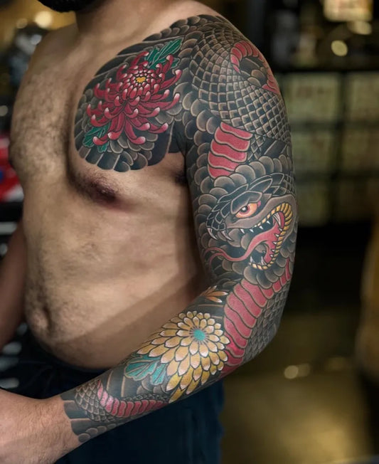 Big Japanese Dragon and Chrysanthemums on Men Arm Tattoo by @fivepointsnyc