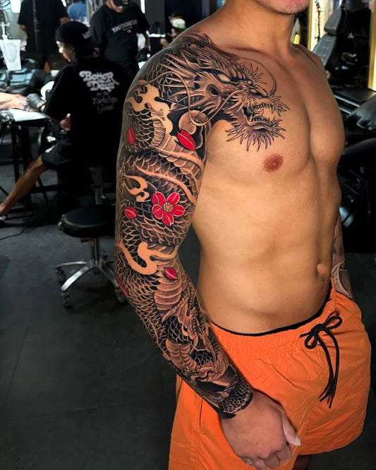 Big Japanese Dragon and Flowers on Men Arm Tattoo by @cangguinkclub