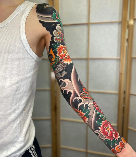 Big Japanese Dragon and Peonies on Women Arm Tattoo by @jensschnettler