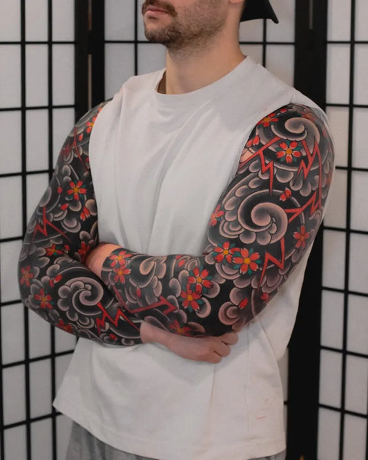 Big Japanese Flowers and Waves on Men Arms Tattoo by @ethiertattoo