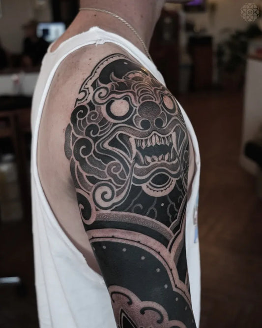 Big Japanese Foo Dog on Men Shoulder Sleeve Tattoo by @undulmood