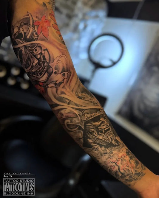 Big Japanese Hannya Mask and Flowers on Men Arm Sleeve Tattoo by @tattoo.times