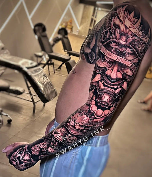 Big Japanese Hannya Mask and Flowers on Men Arm Tattoo by @wahyu.ink_