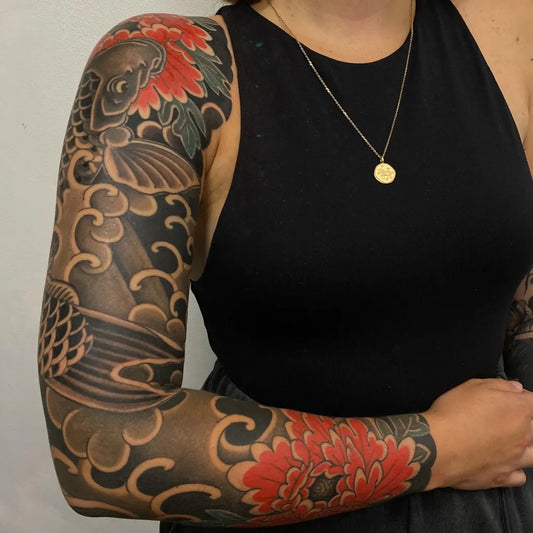 Big Japanese Koi Flower Shell on Women Arm Tattoo by @augustodefilippo