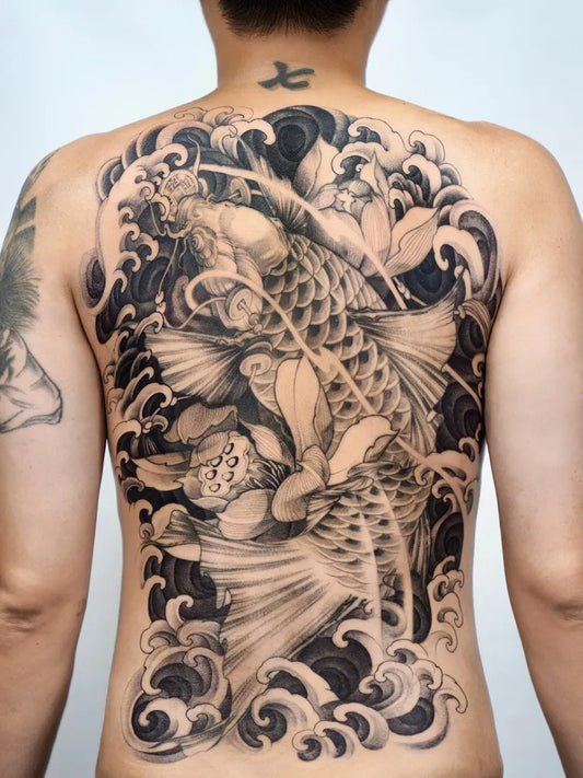 Big Japanese Koi Lotus Waves on Men Back Tattoo by @baronarttattoo