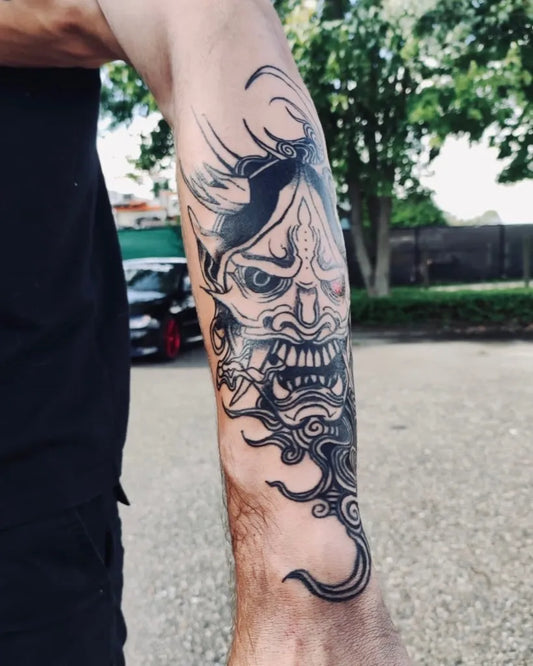 Big Japanese Oni Mask with Flames on Men Arm Tattoo by @rotteridder