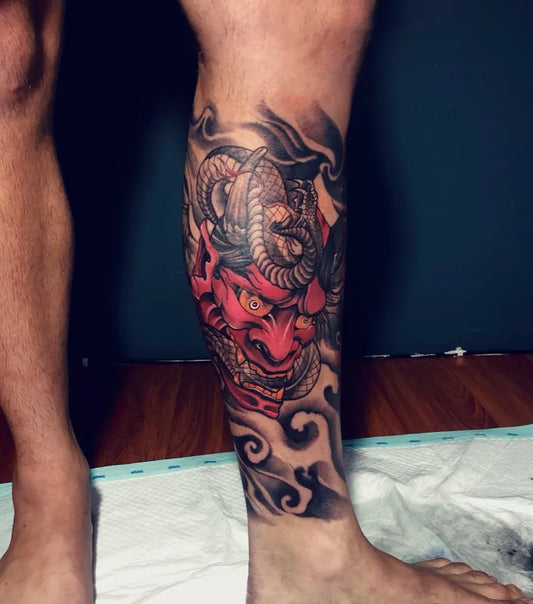 Big Japanese Oni Mask with Horns and Waves on Men Leg Tattoo by @lucky7_tattoobali