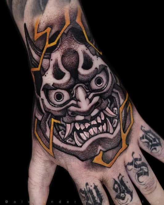Big Japanese Oni Mask with Lightning on Men Wrist Tattoo by @alexunderwood_tattoo