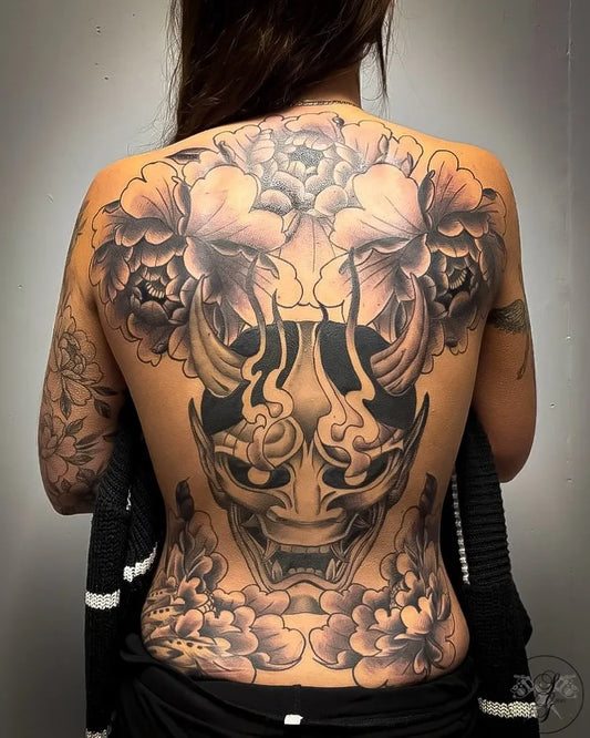 Big Japanese Oni Mask with Peonies on Women Back Tattoo by @blackdaggertattoonorwich