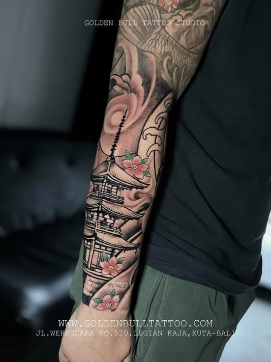 Big Japanese Pagoda and Cherry Blossoms on Men Arm Tattoo by @goldenbullbalitattoo