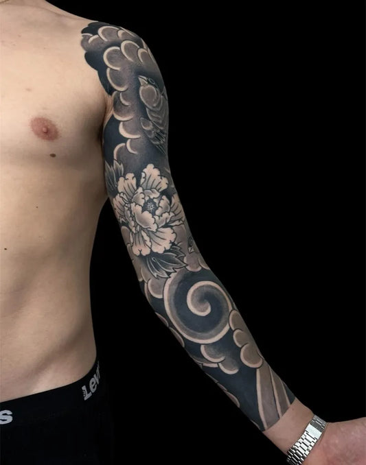 Big Japanese Peony Clouds on Men Arm Tattoo by @andresbocco.ttt