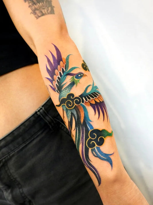 Big Japanese Phoenix and Clouds on Women Arm Tattoo by @rolypolyc
