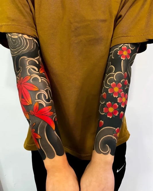 Big Japanese Red Maple Leaves and Waves on Men Arm Tattoo by @japanese.ink