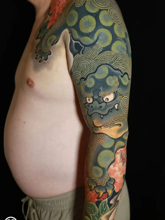 Big Japanese Shisa Dragon and Peony on Men Arm Tattoo by @jinhaitattoo